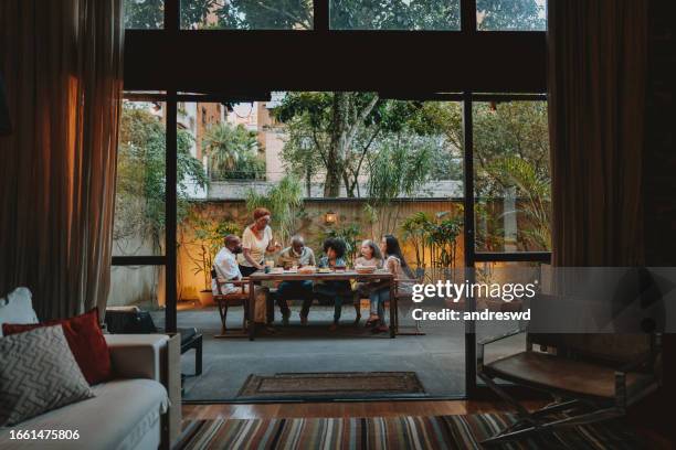 Family gathered at the table at home